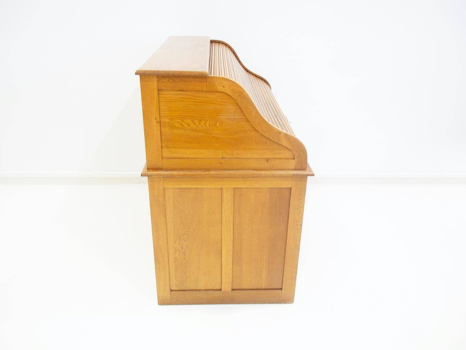 Oak roll-top desk with drawers