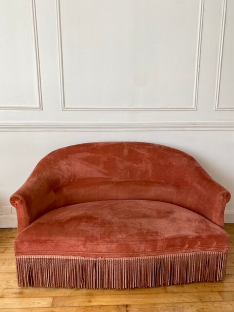 Pink velvet sofa