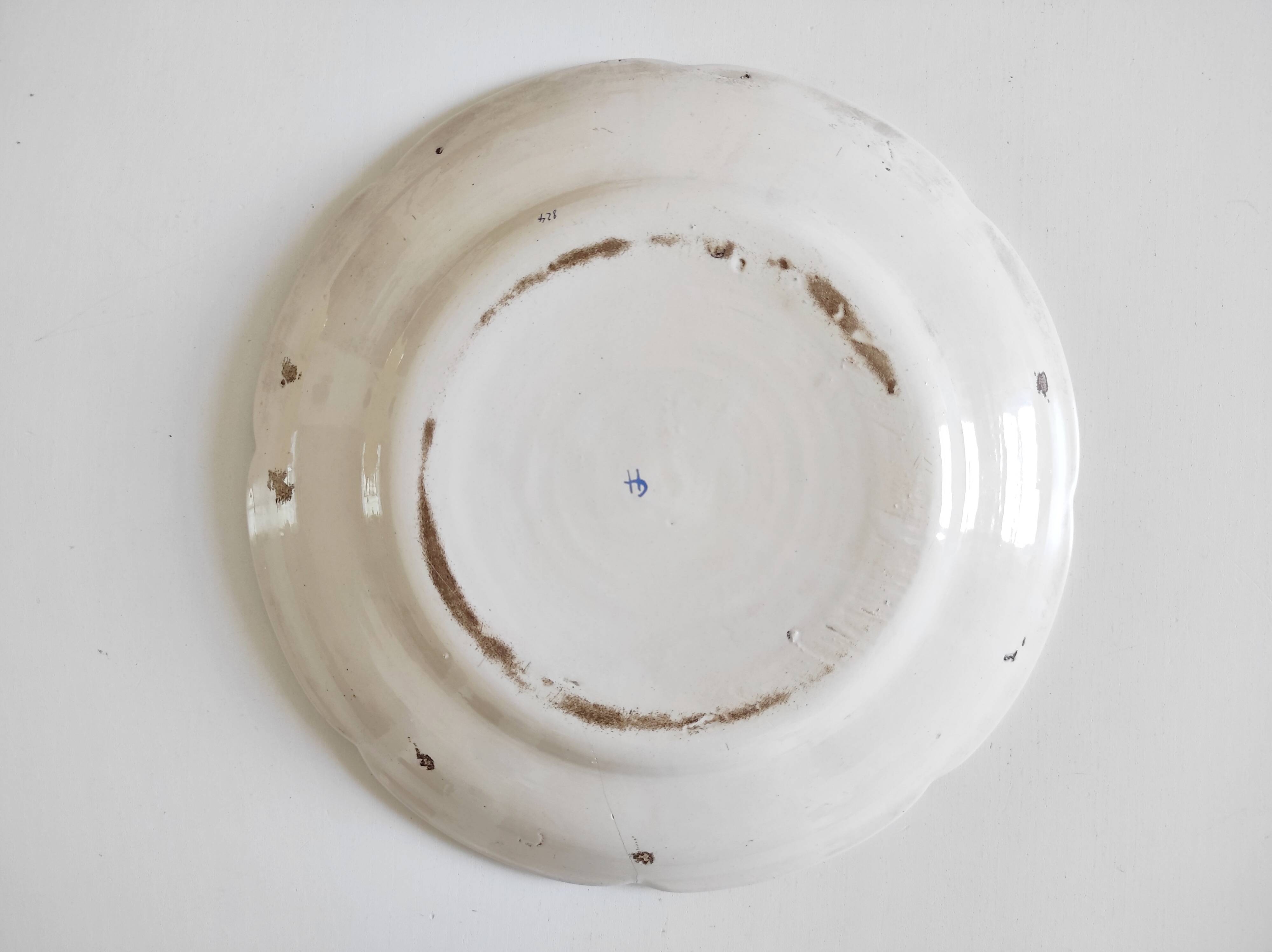 Eastern earthenware plate with flowers