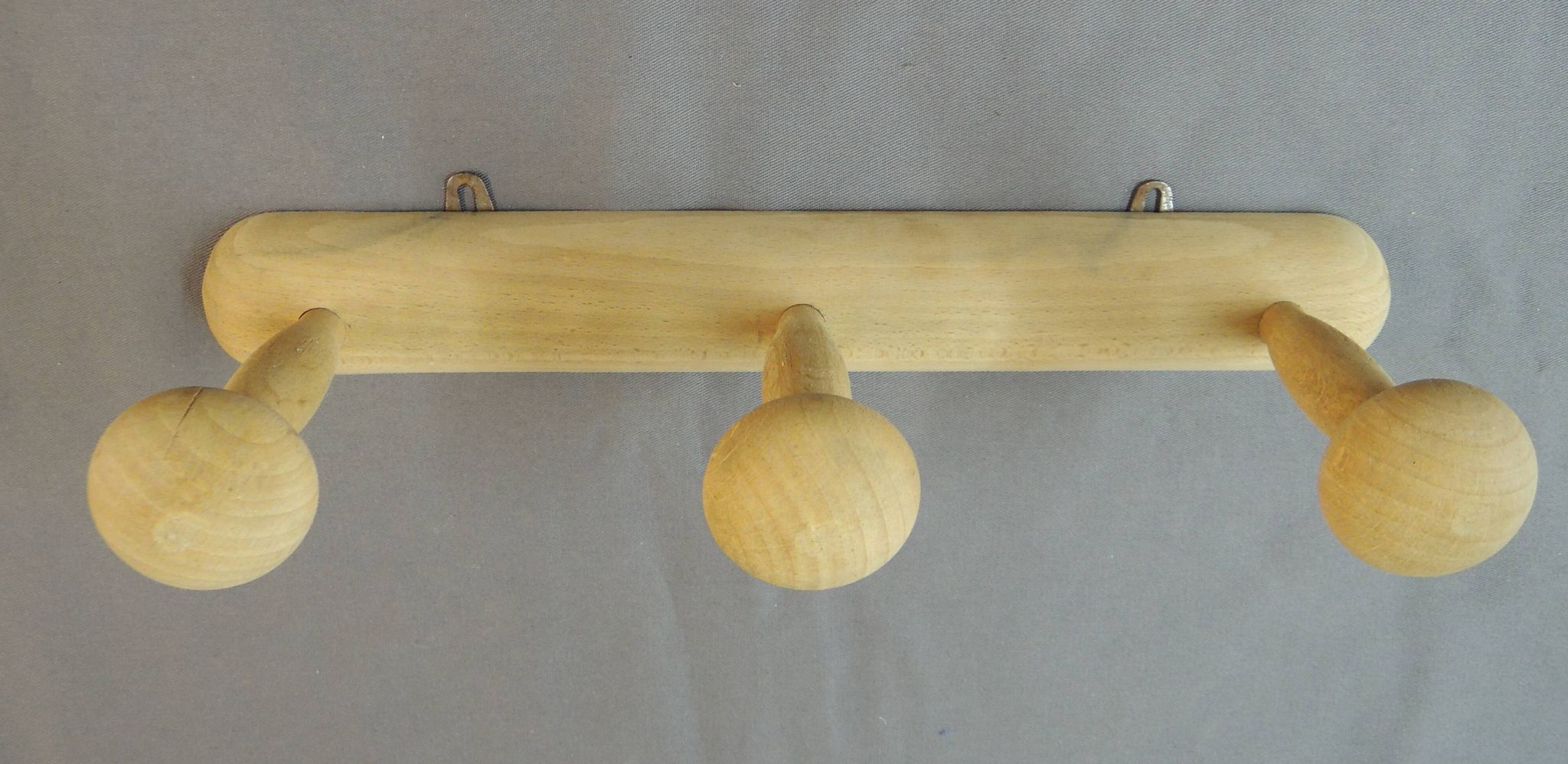 Wall-mounted coat rack