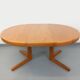 Vintage round dining table in Scandinavian style from the 60s and 70s in elm.