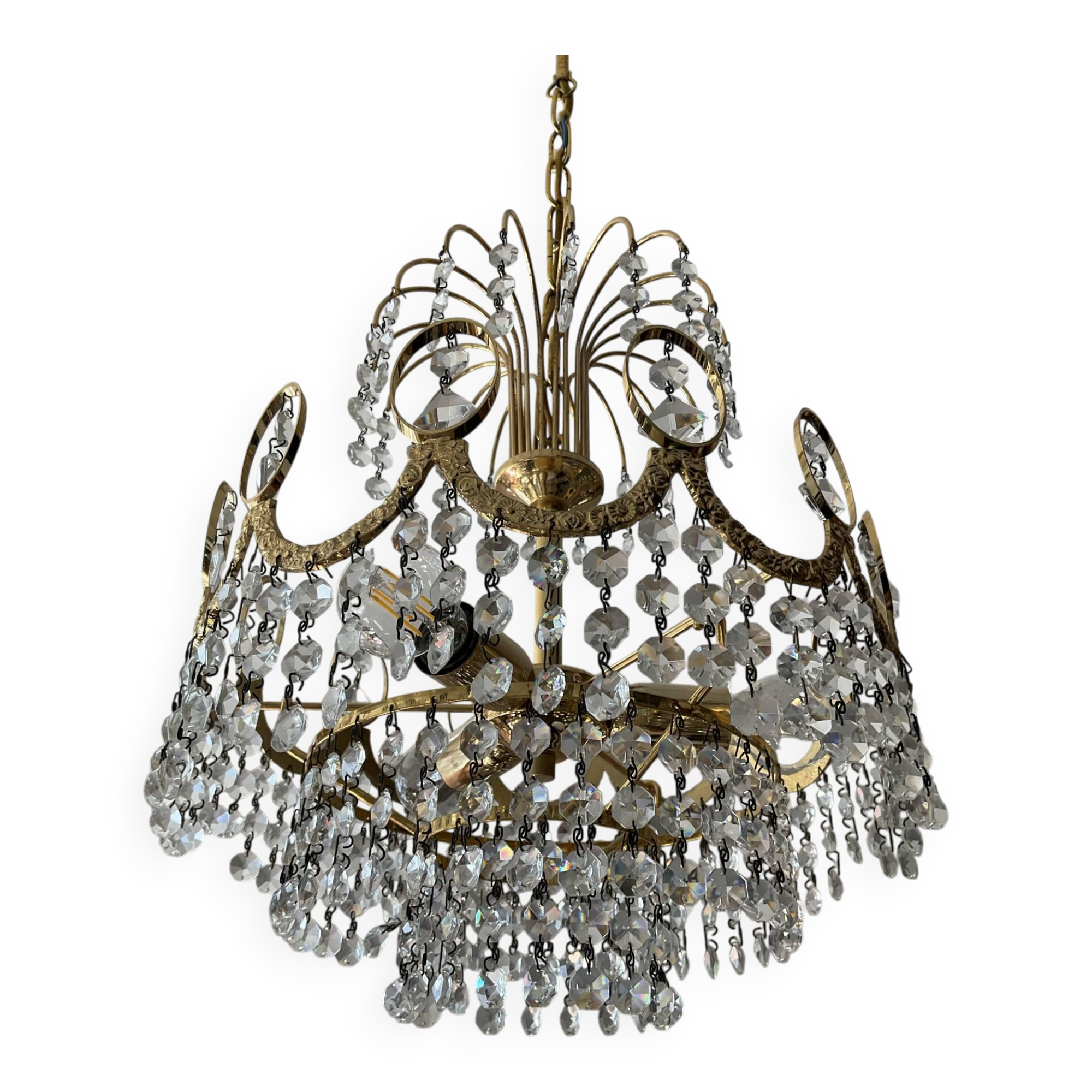Brass chandelier with crystal pendants from the 1970s.