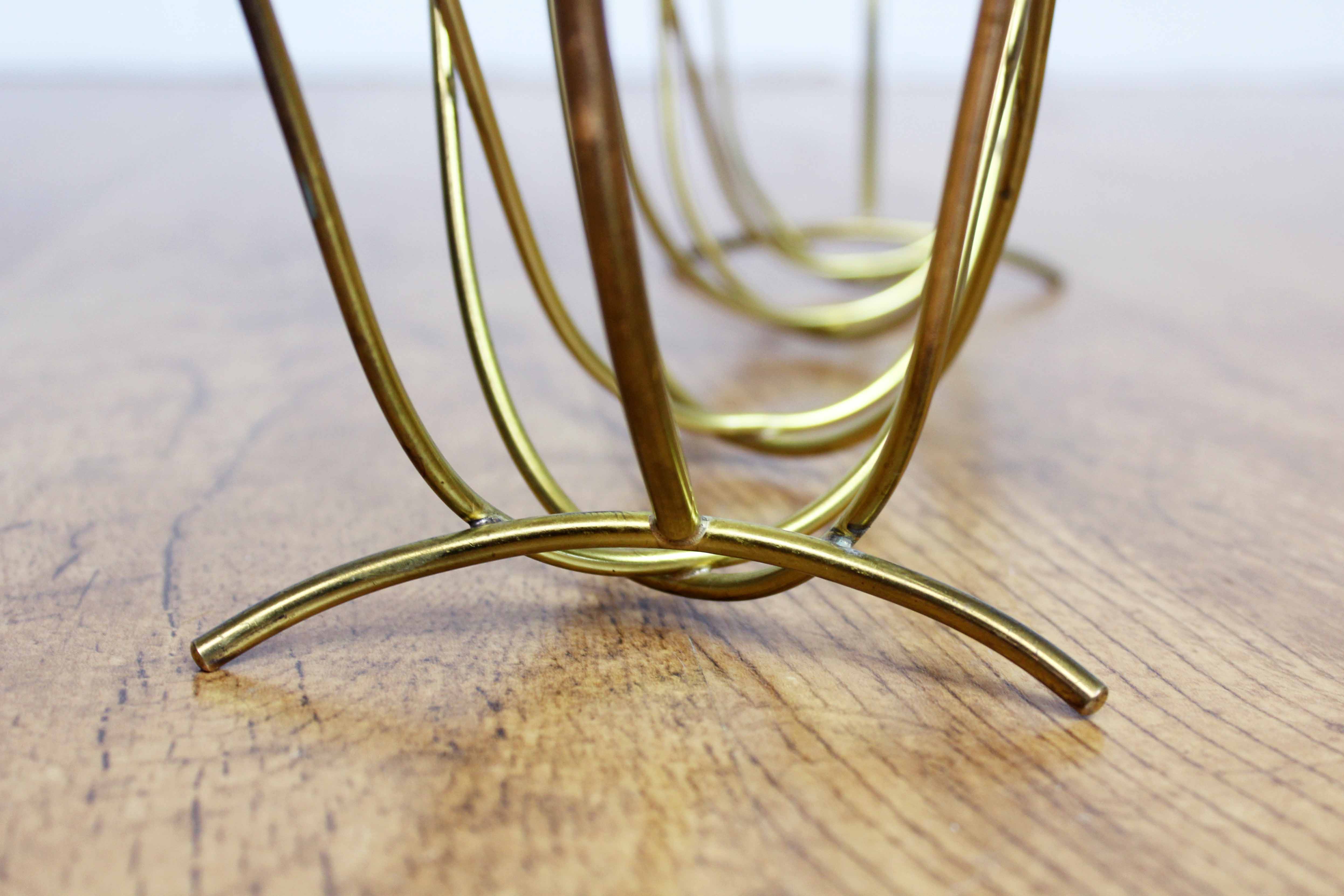 Magazine rack in brass 60