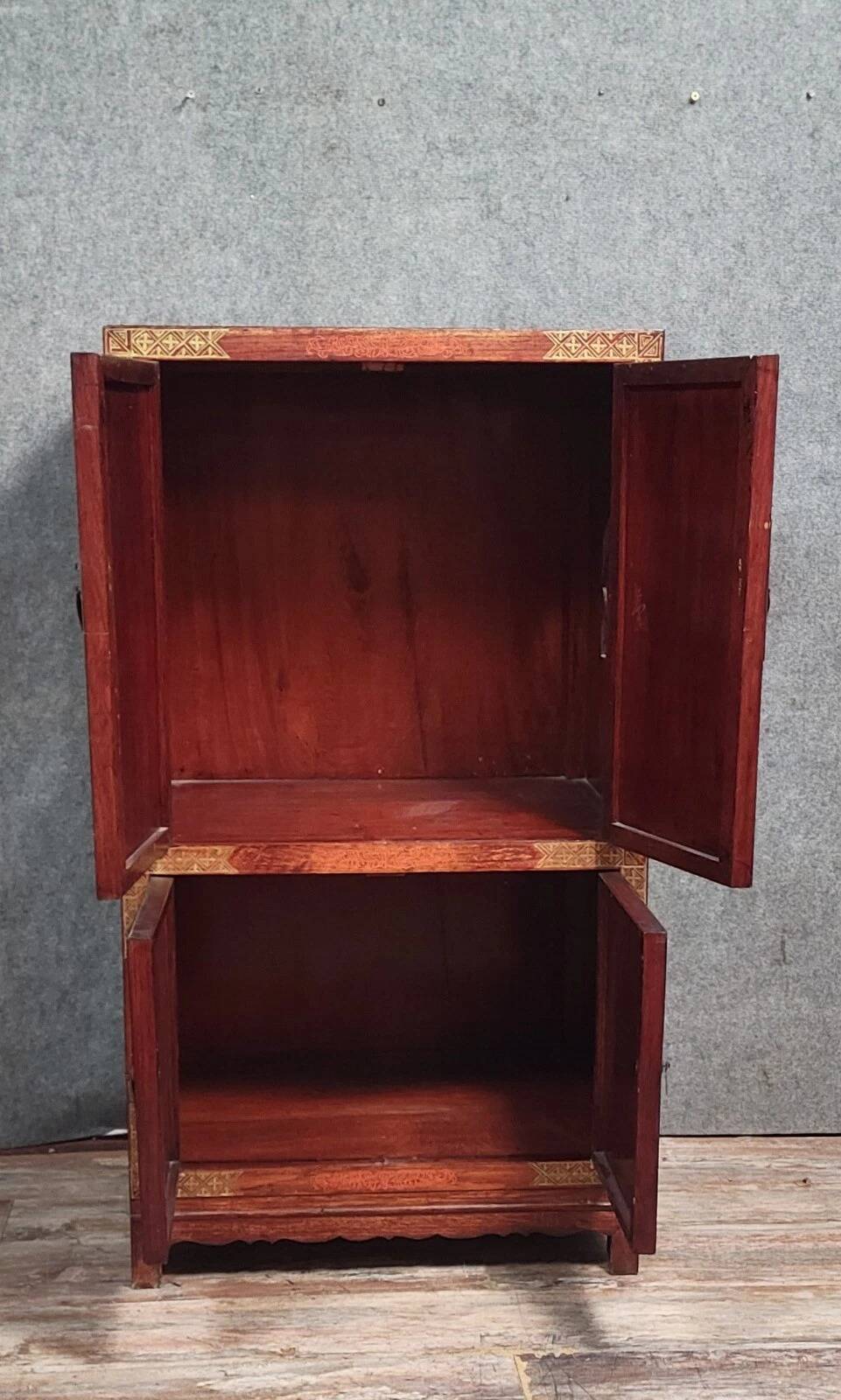 Asia, 20th century: Lacquered cabinet decorated with vases of flowers in hardstone