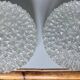 Pair of round vintage moulded glass ceiling lights.