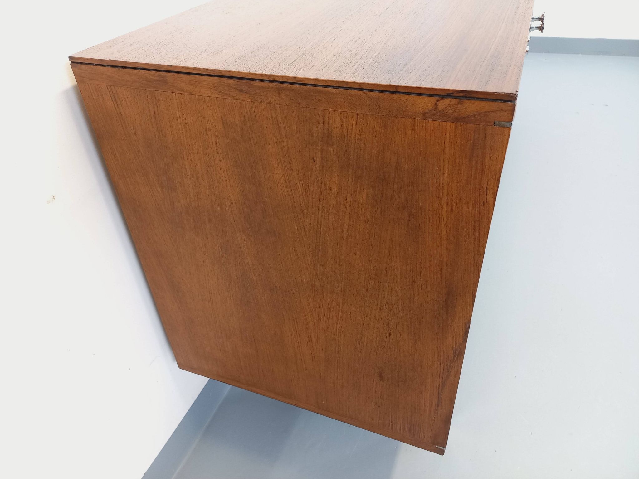 Vintage modernist enfilade in rosewood and chrome metal from the 60s and 70s.
