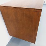 Vintage modernist enfilade in rosewood and chrome metal from the 60s and 70s.