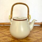 Vintage teapot in stoneware and wicker