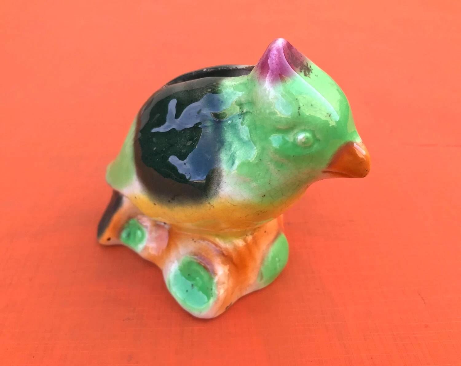 Polychrome ceramic parrot shape