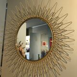 Golden brass sun mirror