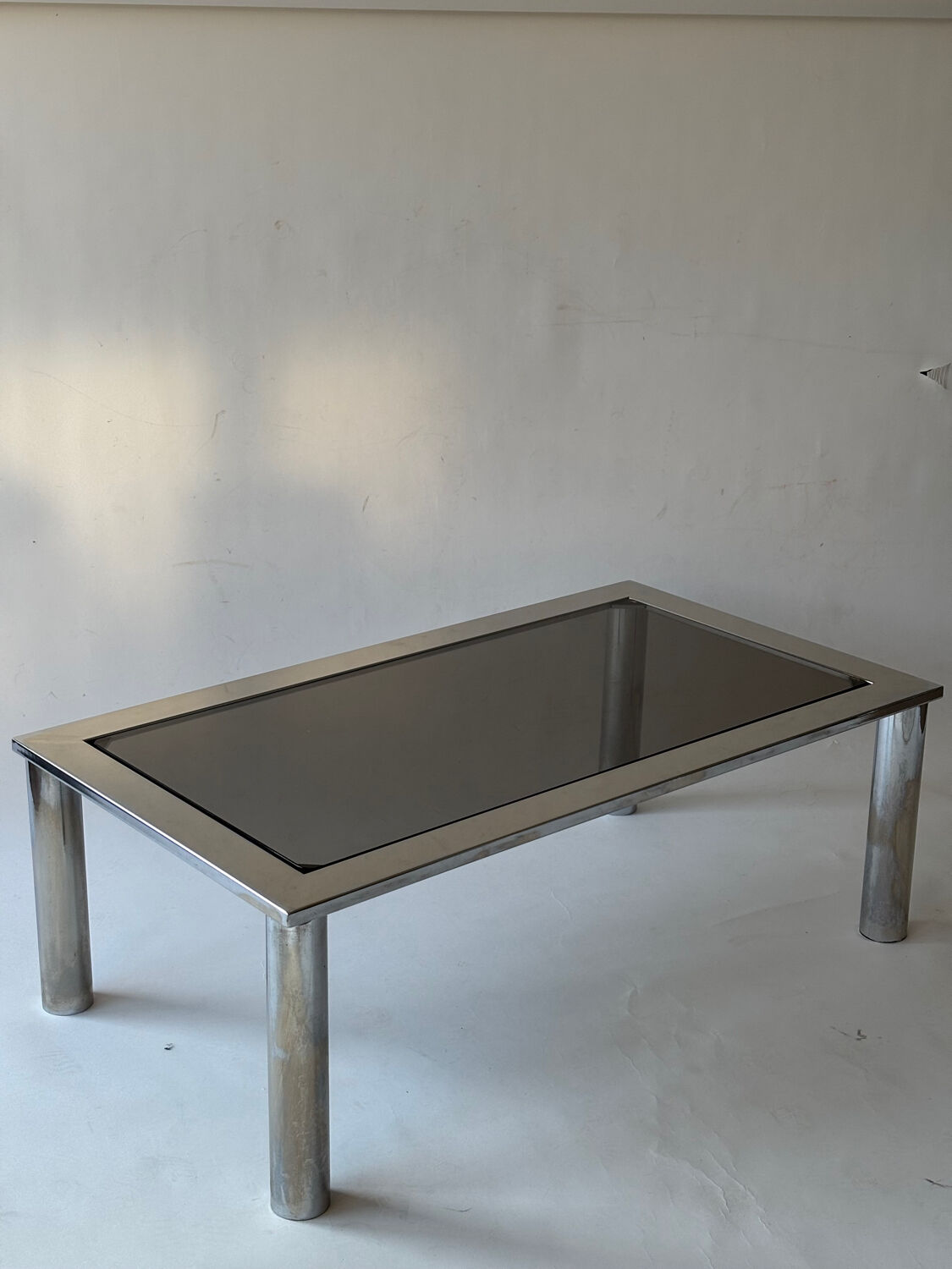 Chrome metal and smoked glass coffee table, 1970.