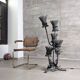Brutalist floor lamp with five thistle-shaped lights in black wrought iron, 1970s