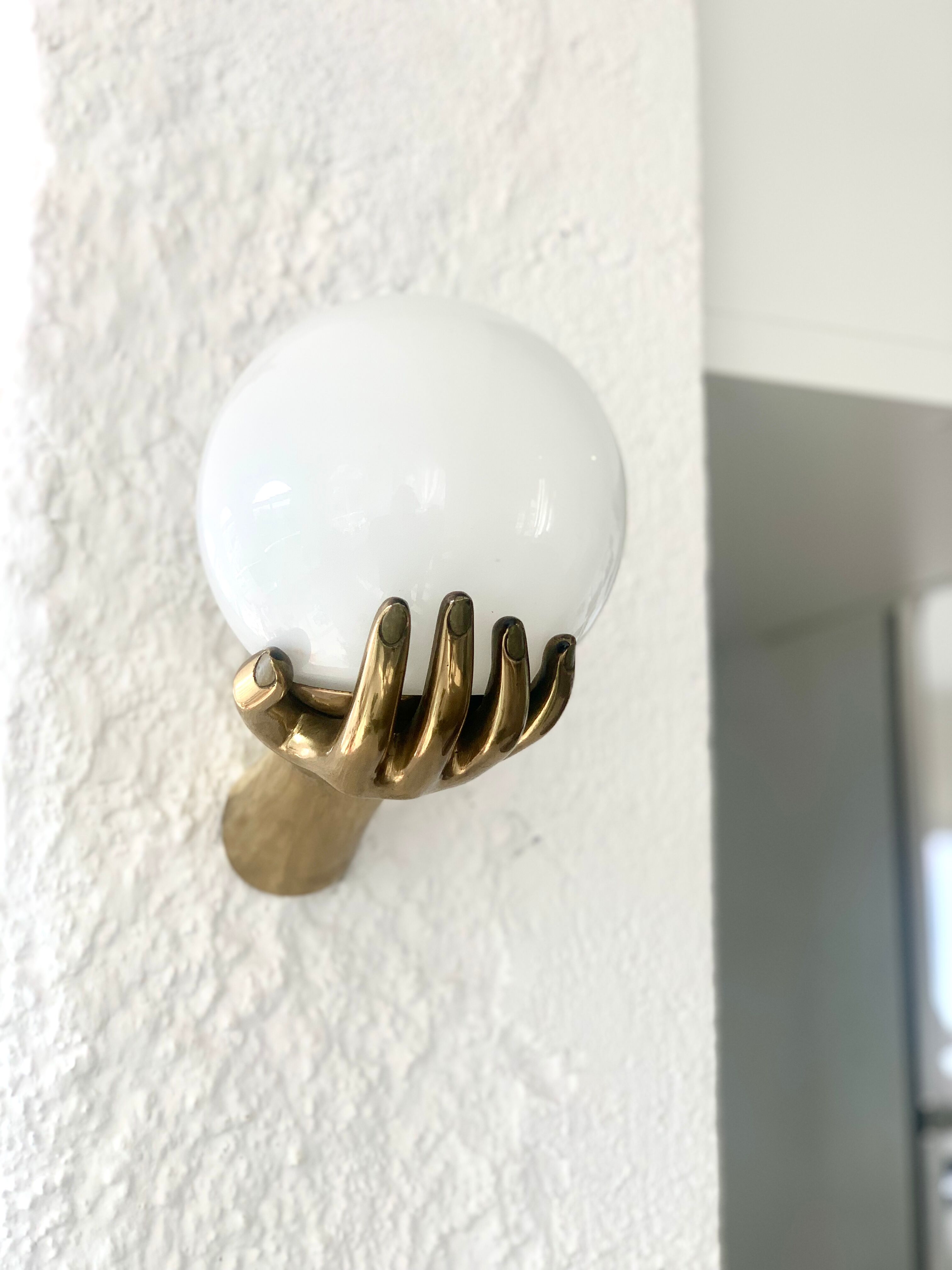 Pair of brass "hands" wall lamps, Arlus 1960