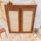 Armoire basse en bois brut et raphia tressé
