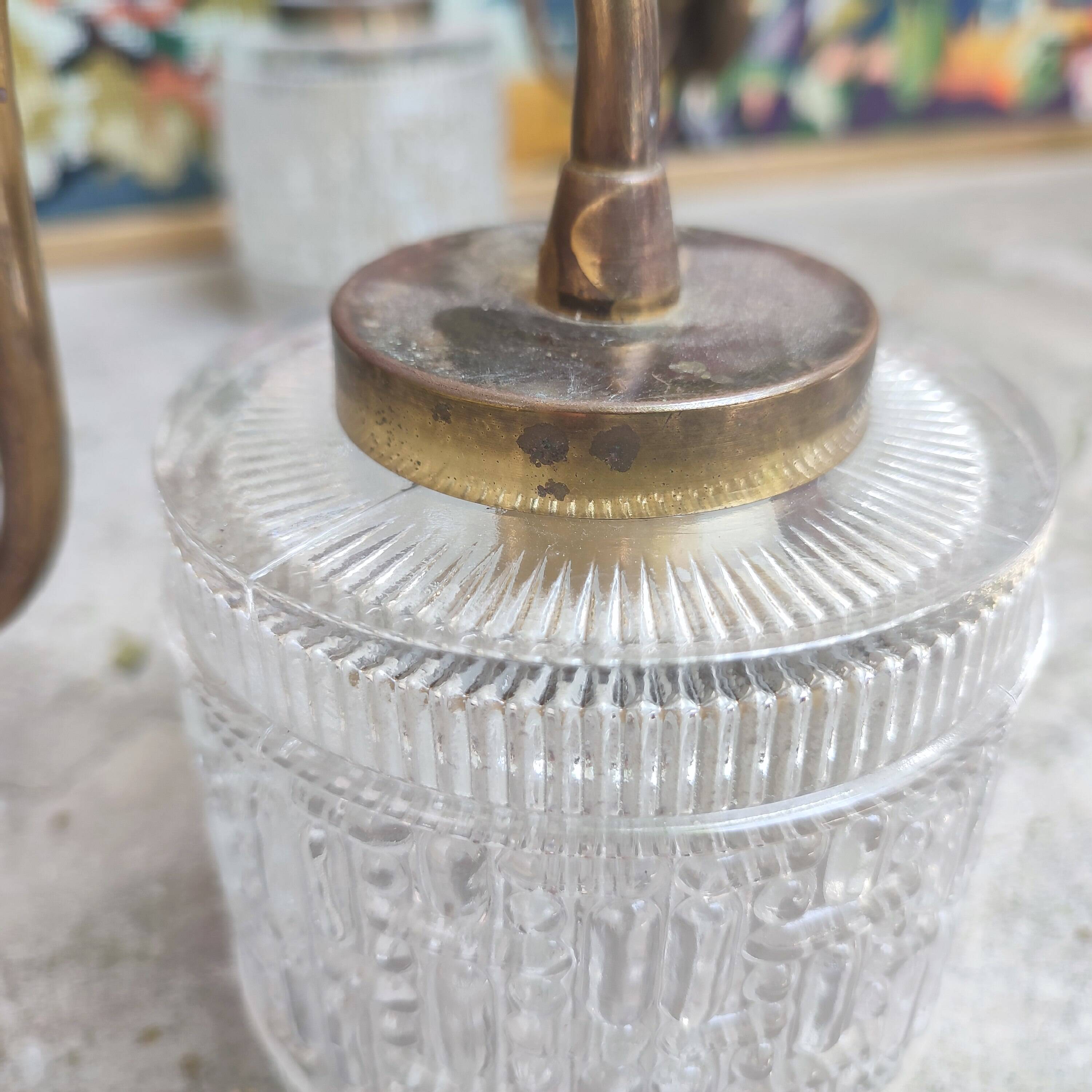 Pair of cylindrical tulip wall lights from the 1950s.