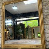 Louis-Philippe mantel mirror 133cm/115.5cm beaded gilded with gold leaf geometric decoration, late 19th century, heavily pitted and scratched glass, parquet on the back.