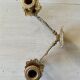 Pair of brass wall candle holders