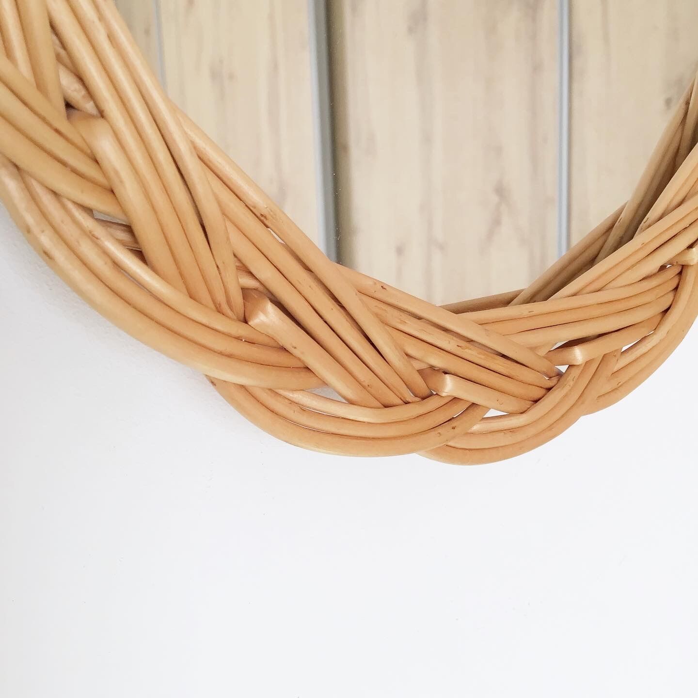 Vintage oval rattan mirror