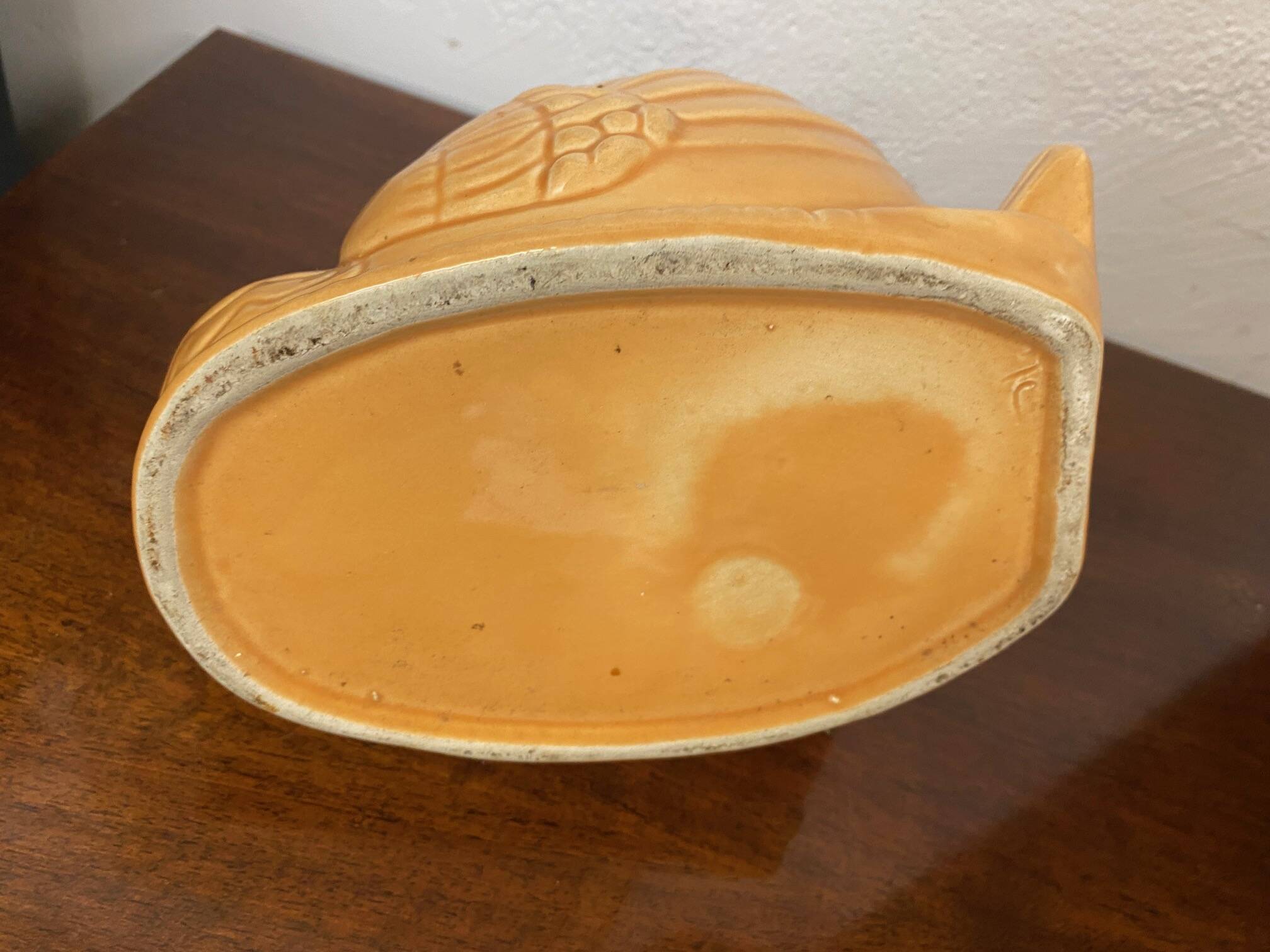 Swan shaped planter in 70s earthenware apricot orange color