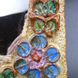 Flower-decorated sandstone mirror, circa 1970