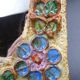 Flower-decorated sandstone mirror, circa 1970