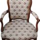Louis XV cabriolet armchair upholstered in floral fabric