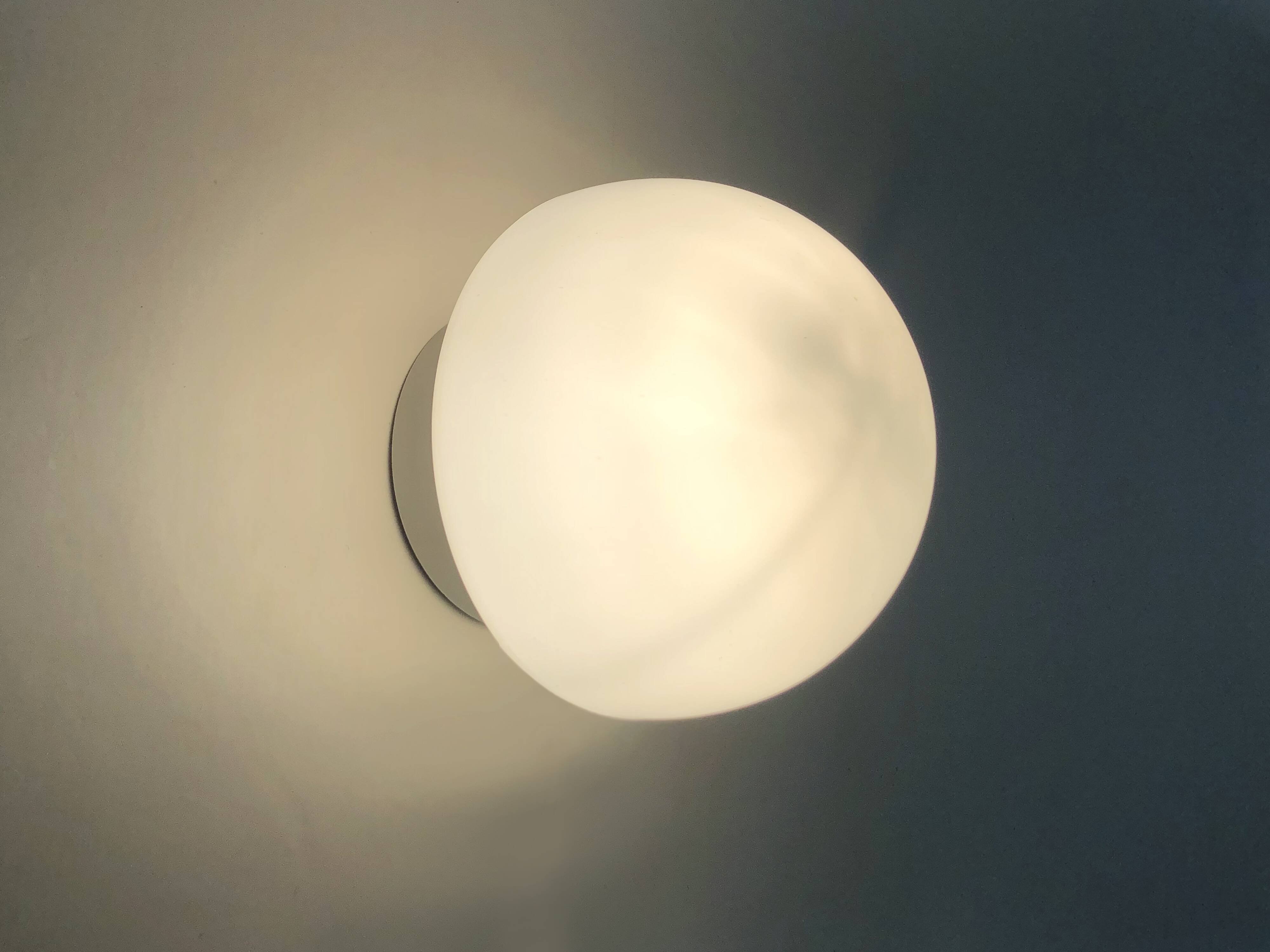 Pair of white mushroom-shaped wall lights. 1970s