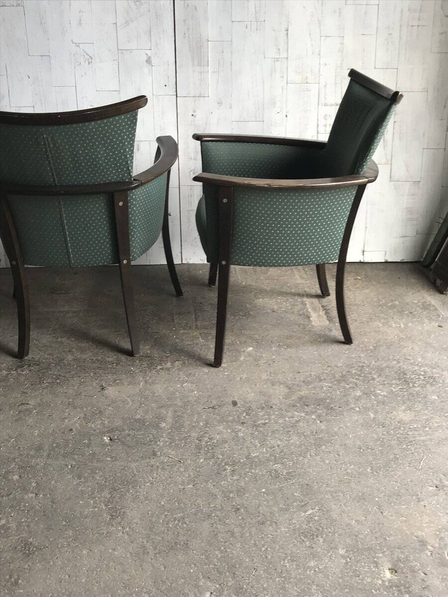 Pair of mid-century armchairs in wood and green fabric, 1960s, vintage style.
