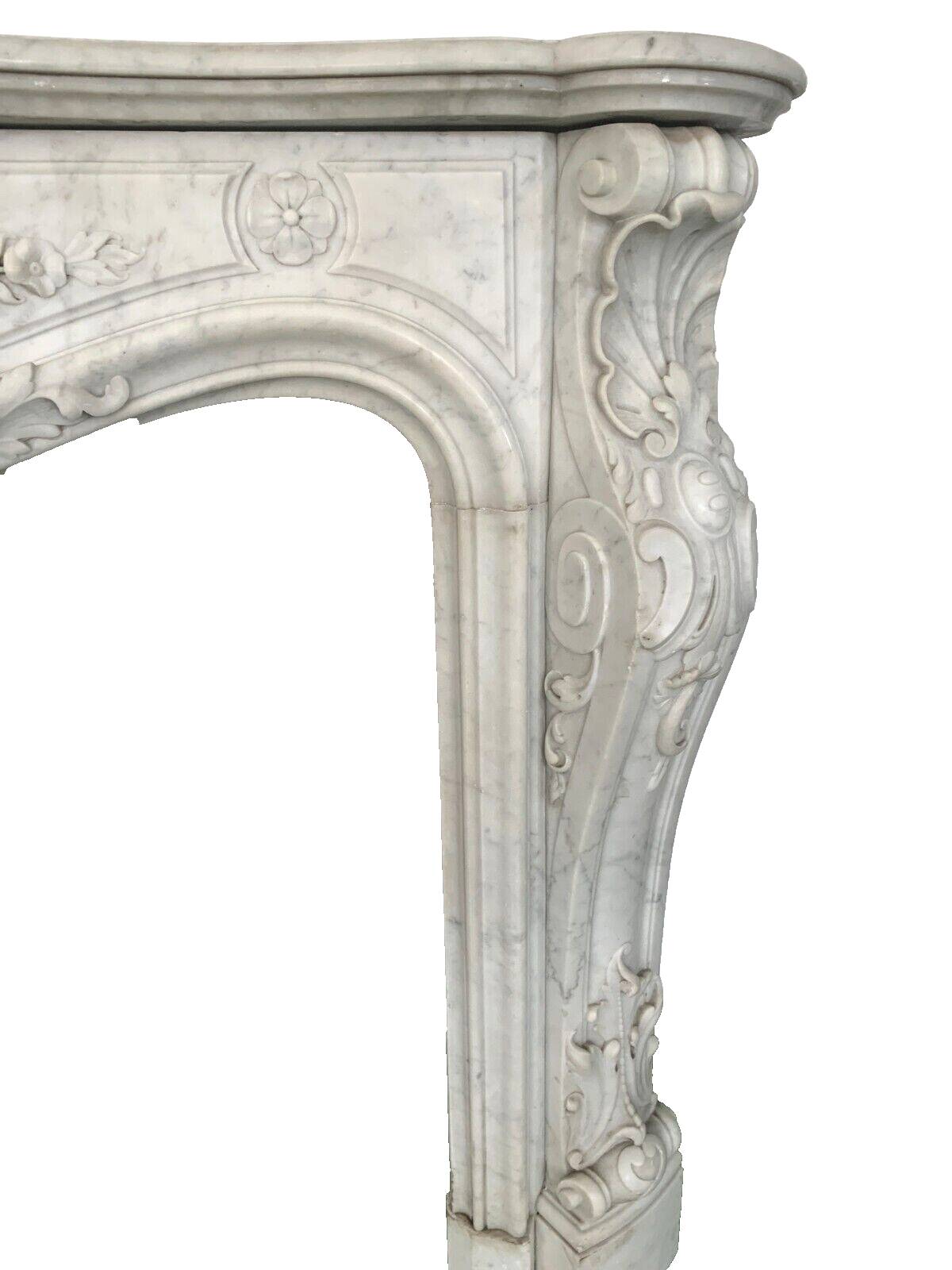 Louis XV style fireplace in white Carrara marble 19th century