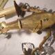 1 crystal prism wall light with 2 lights. Brass frame