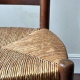 Set of 8 wooden chairs with rattan seats from the 1950s