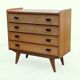 Vintage commode from the 1960s with tapered legs.