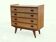 Vintage commode from the 1960s with tapered legs.