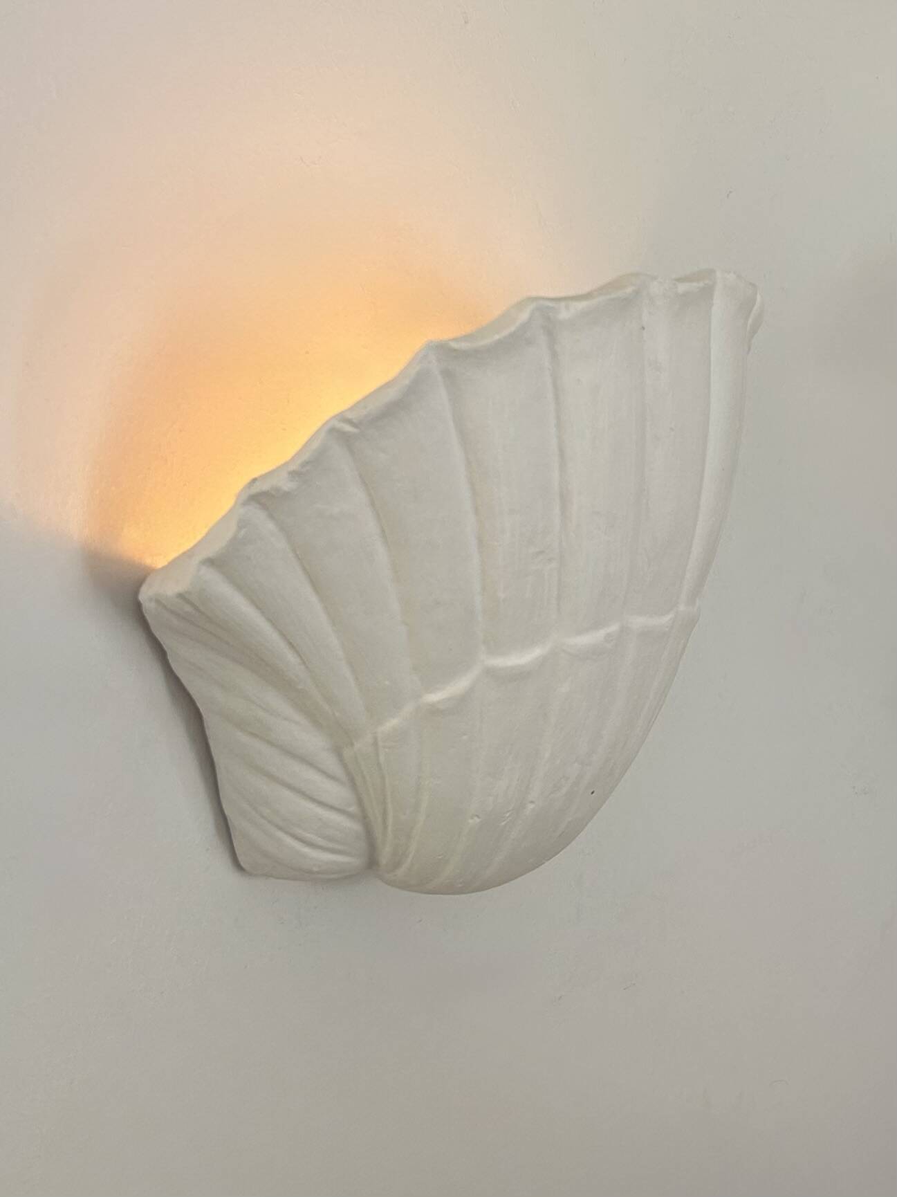 Pair of vintage shell wall lights, matte white plaster, France, 1970.