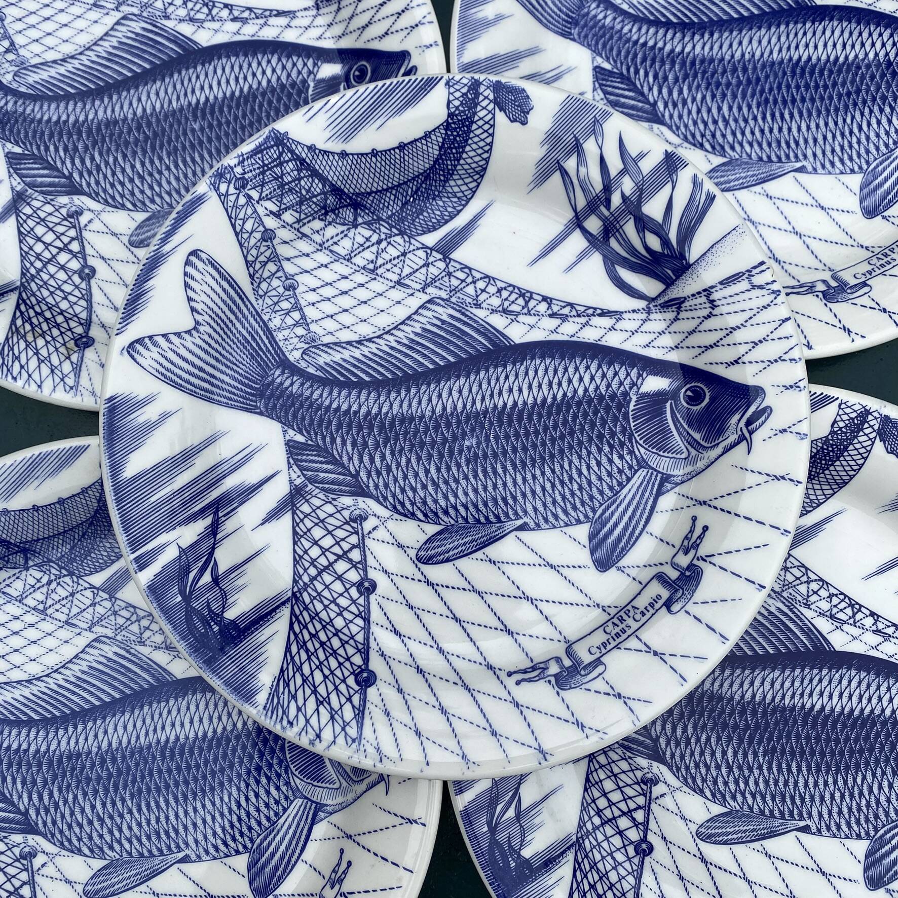 Plates and dish, fish service with cobalt blue decoration.