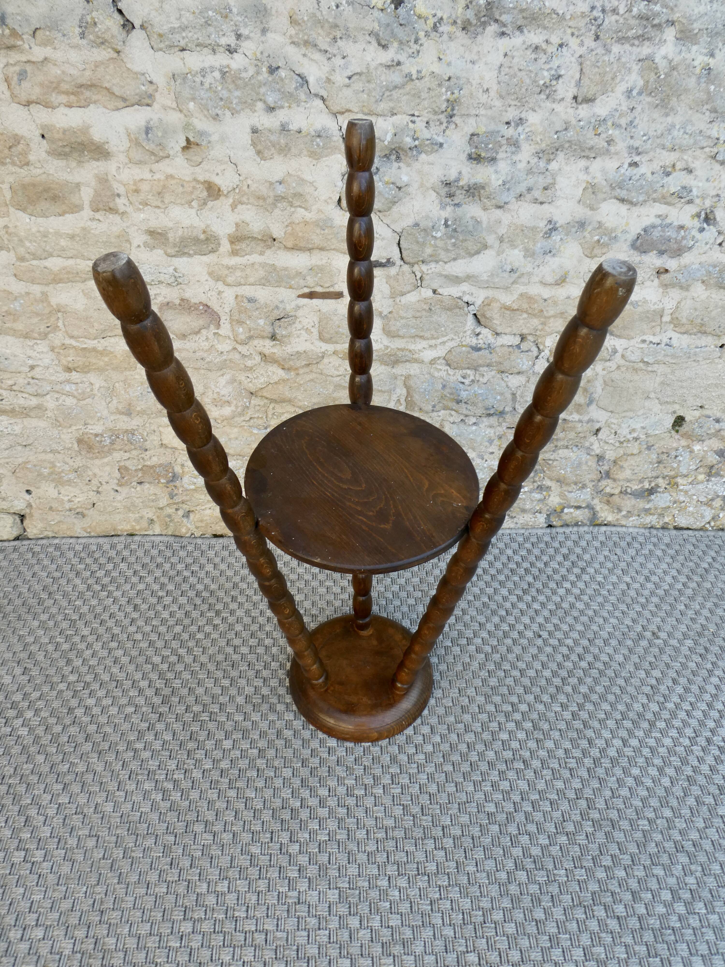 Turned wooden tripod stand