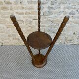 Turned wooden tripod stand