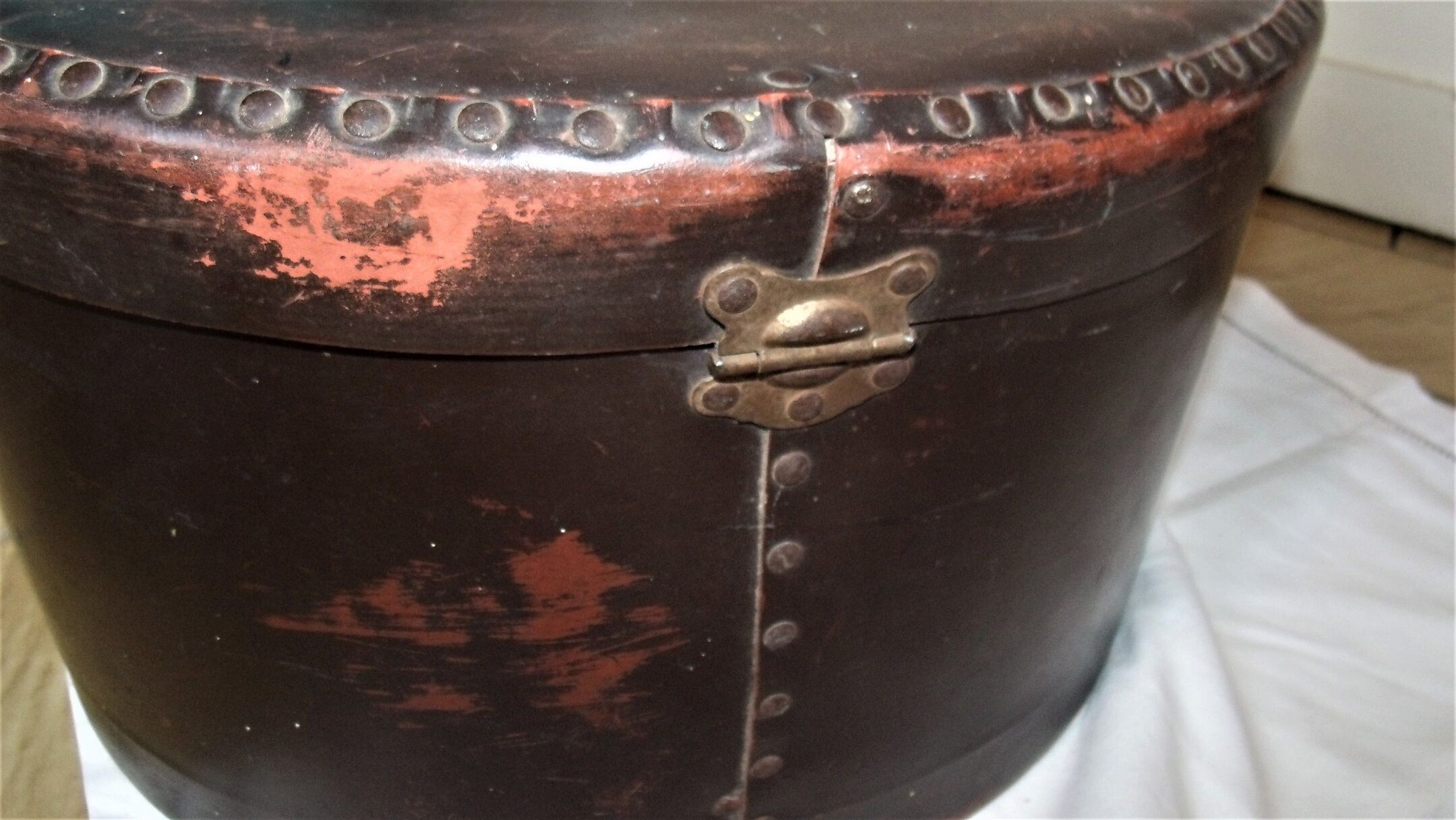 Studded old leather hat box