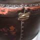 Studded old leather hat box