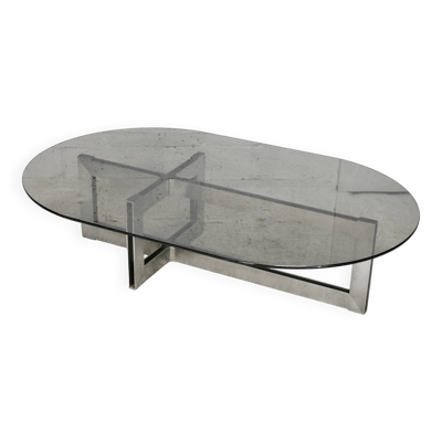 Table basse piètement acier et dalle de verre fumé. Circa 197
