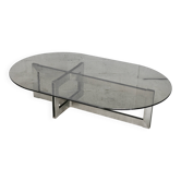 Table basse piètement acier et dalle de verre fumé. Circa 197