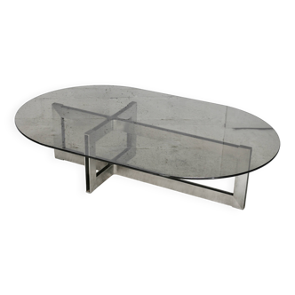 Coffee table with steel base and smoked glass slab. Circa 197