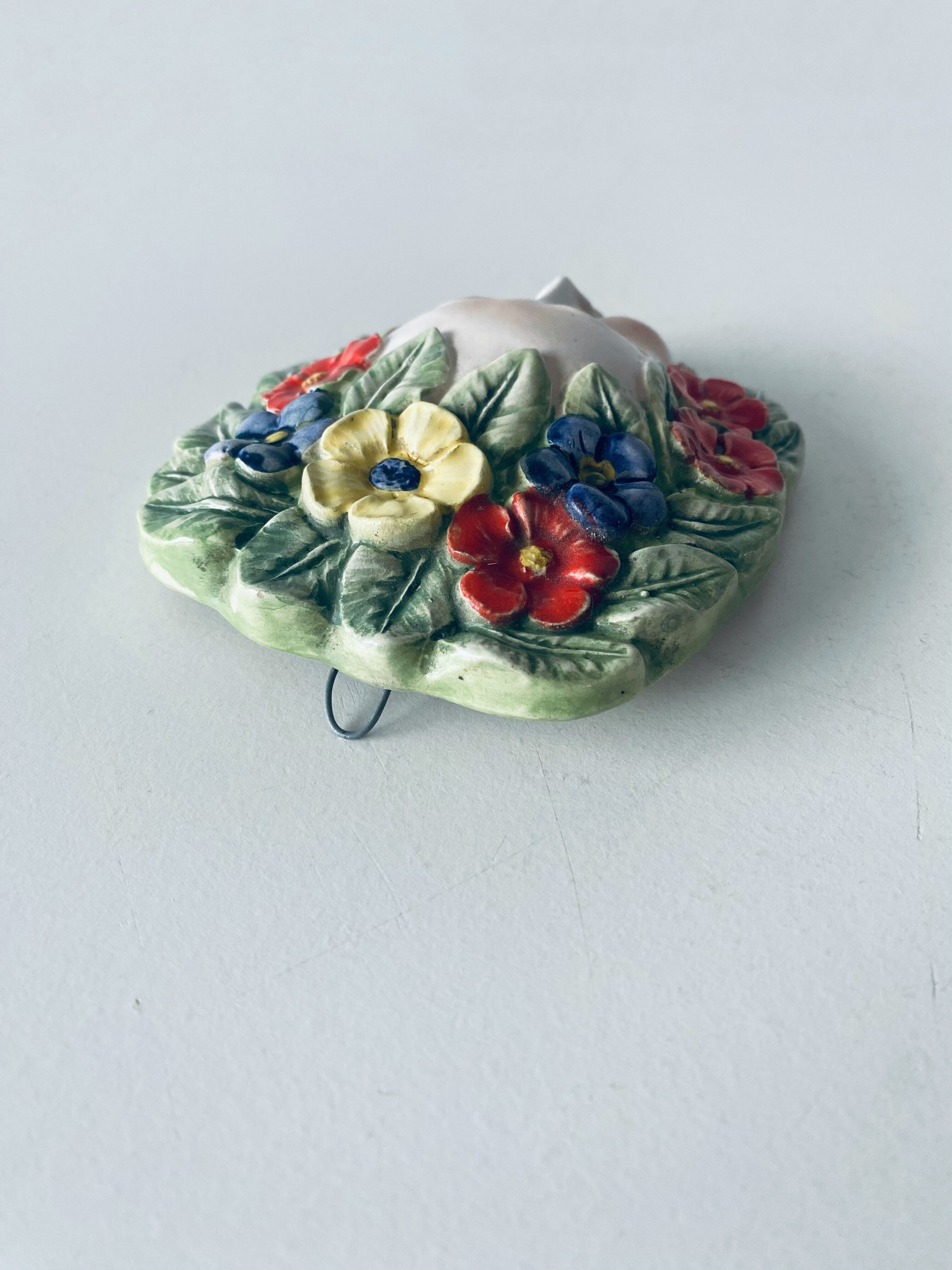 Ceramic wall face signed Il Falco