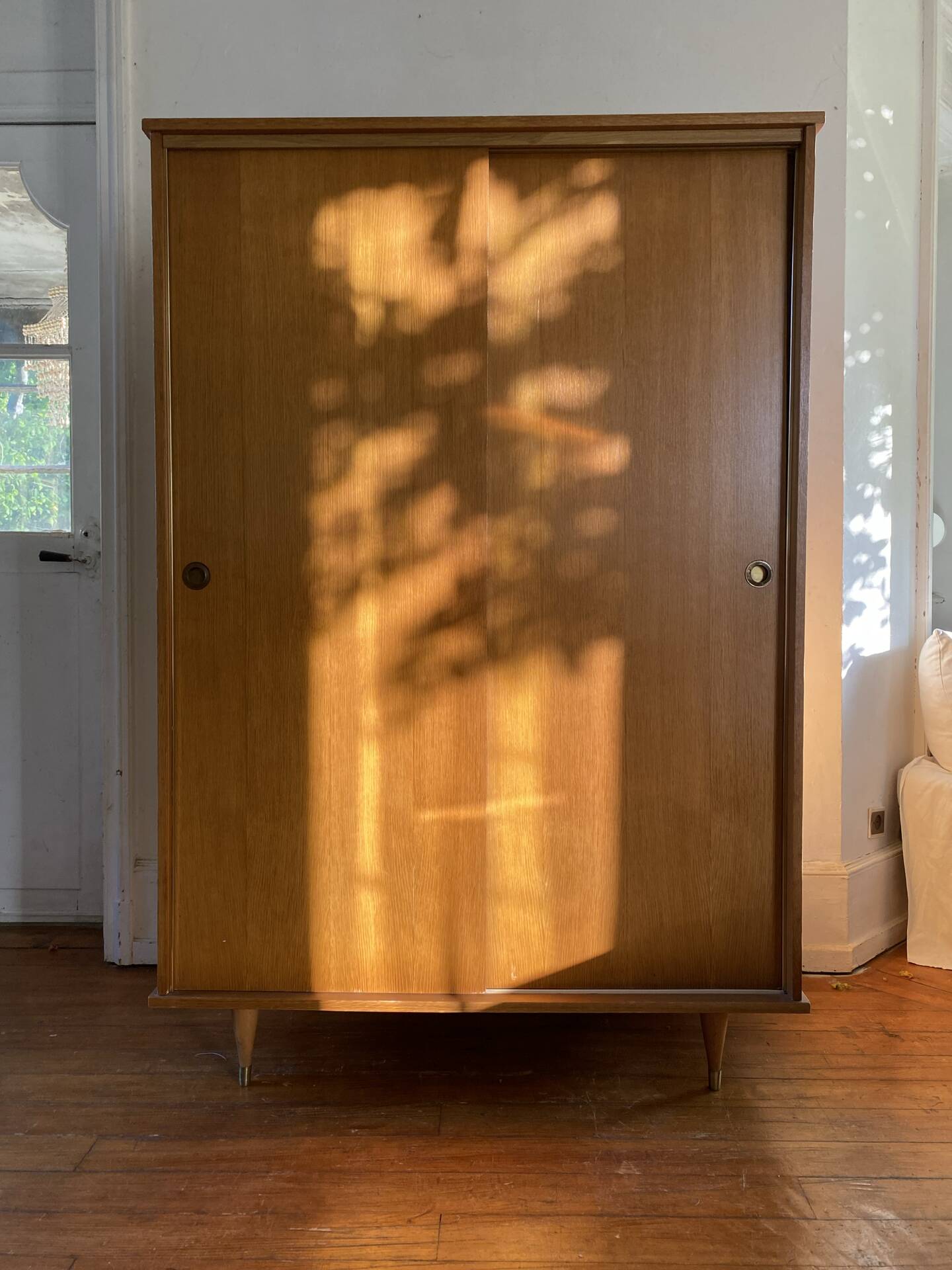 Large vintage Scandinavian wardrobe with two sliding doors.