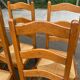 6 solid oak dining chairs with rush seats from the 1980s.
