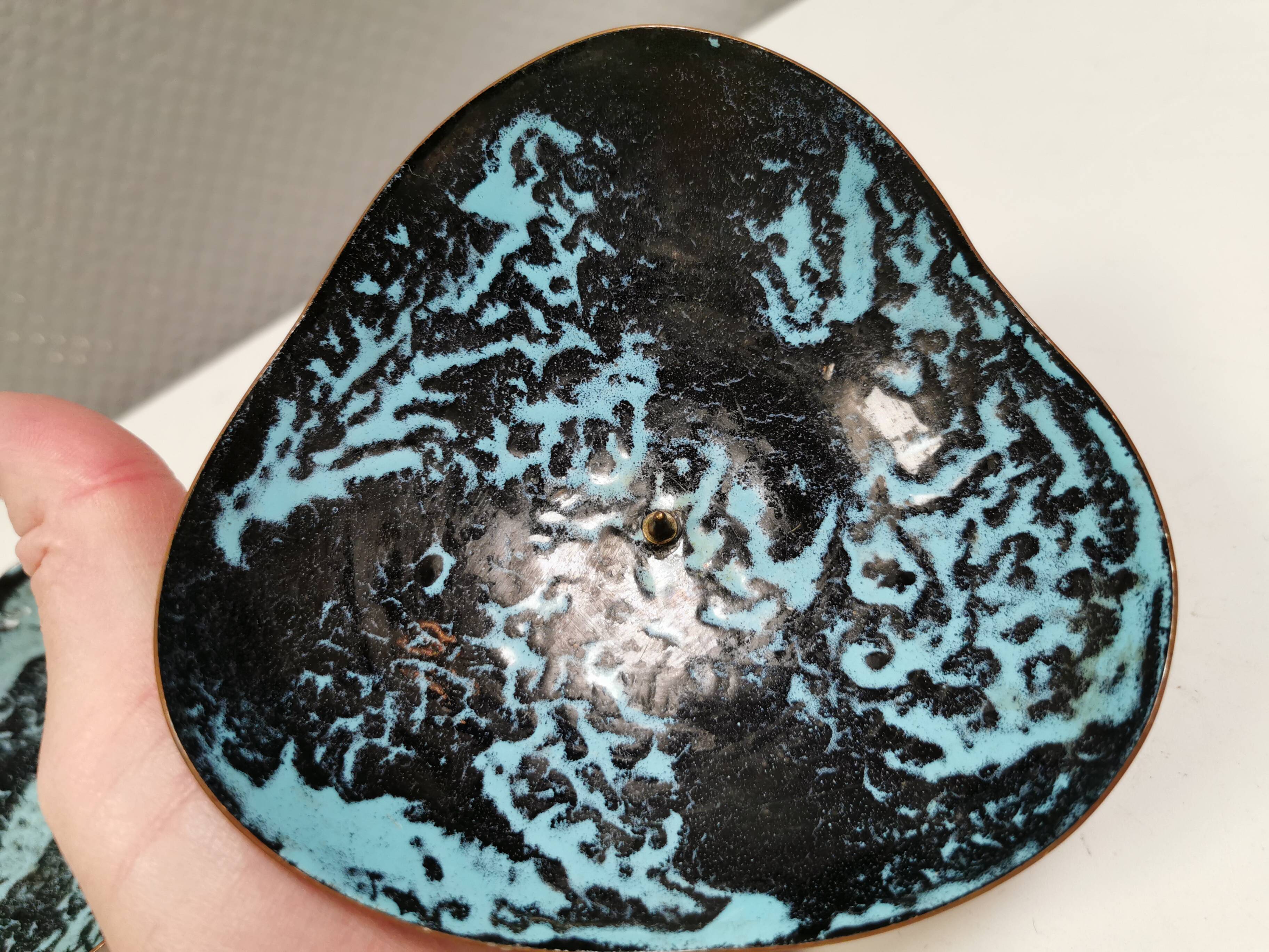 Set of candlesticks. Made of copper and blue/black enamel. From Danish Meka (1951 - 1989)