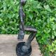 Sculpture of a dancer on a swing signed by Raphaël