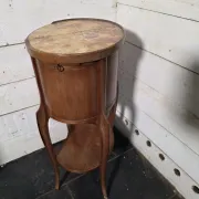 Oval bedside table in Louis XV style made of mahogany.