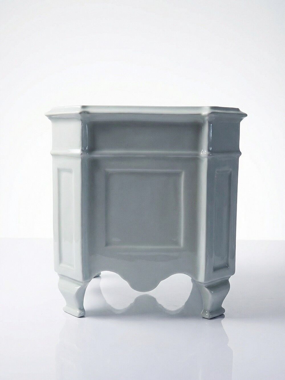 Square cache-pot with feet in celadon Limoges porcelain, Rococo style.