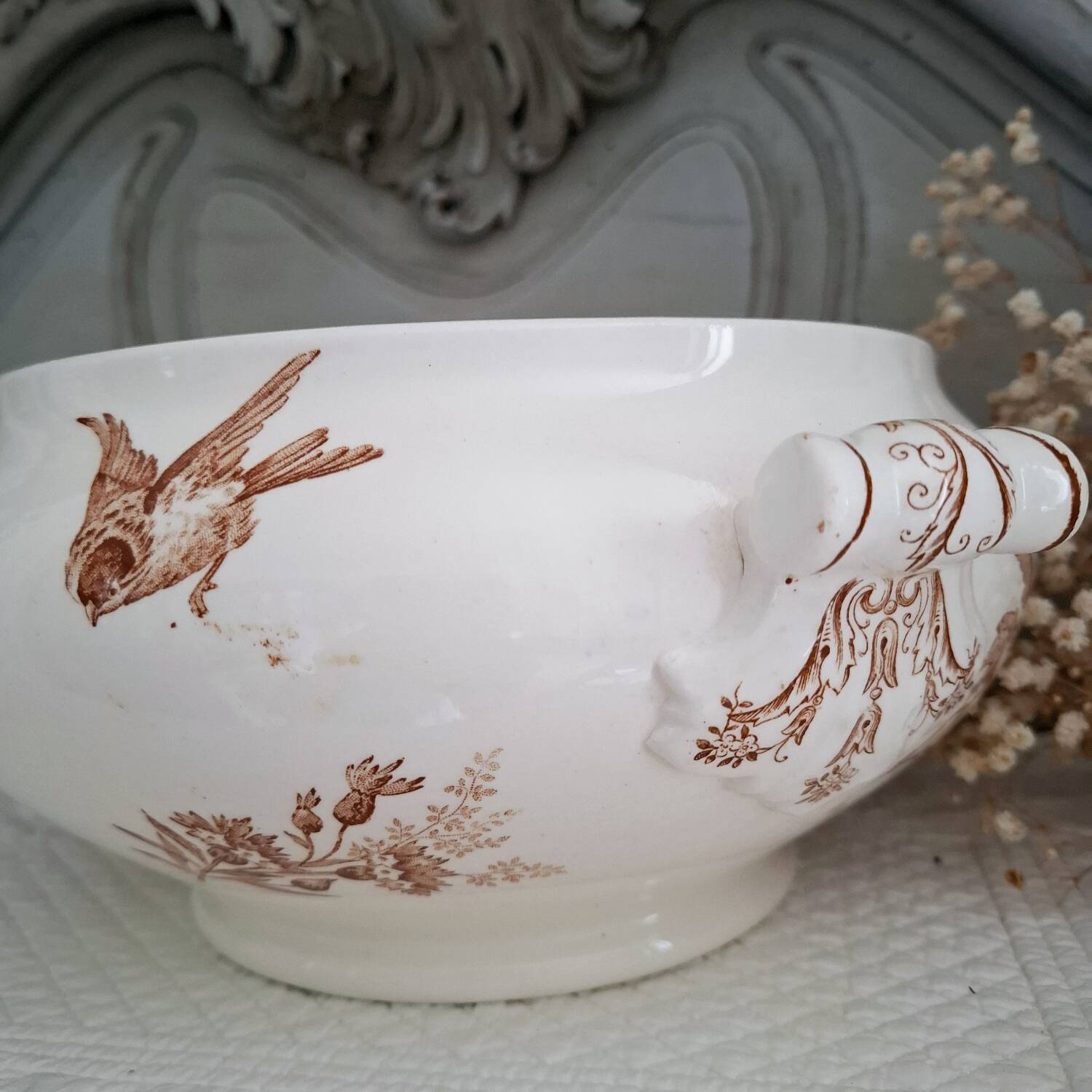 Antique iron earthenware plates accompanied by dishes